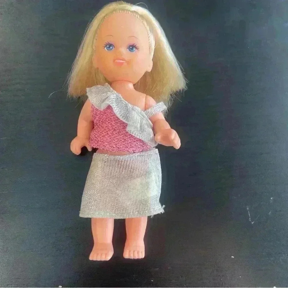 Simba Toddler Doll 4.5” Blonde Hair, Blue‎ Eyes, Pink and Silver Sparkle outfit